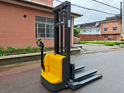 Electro-hydraulic forkleg stacker